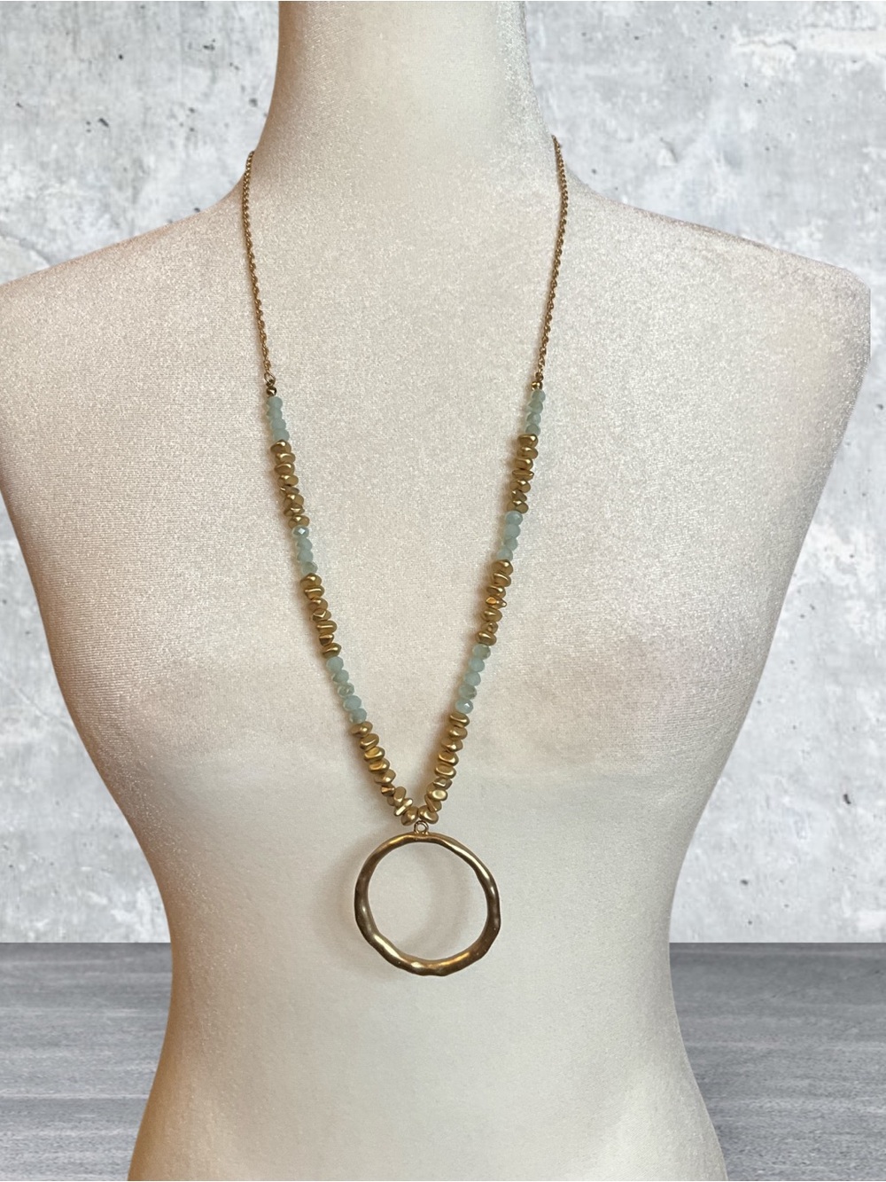 Gold Circle Pendant Necklace with Light Aqua Beads